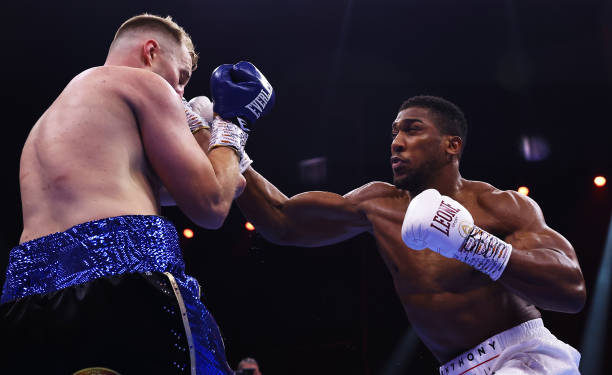 Joshua gets third straight win with Wallin KO