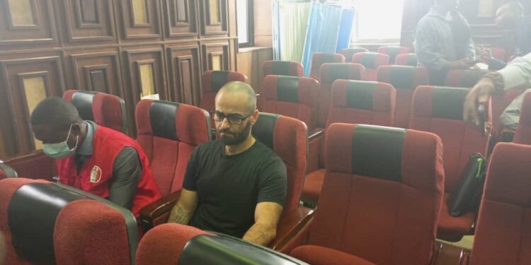 Drama as Binance executive slumps in court