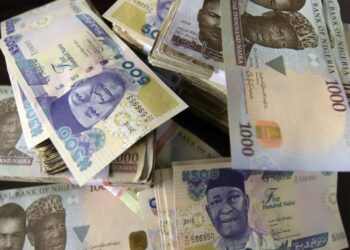 Naira may settle at 1450/$ by Dec, says Fitch Ratings