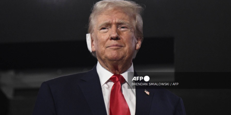 Trump attends Republican convention with bandaged ear after assassination attempt