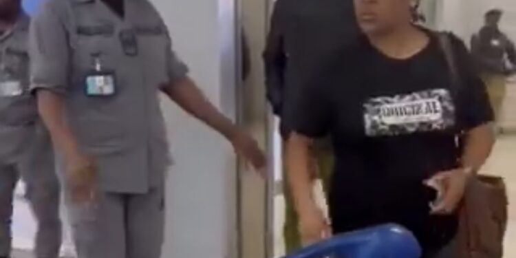 “Netizens Outraged as Woman Tears Husband’s Passport at Lagos Airport; Immigration Launches Investigation”